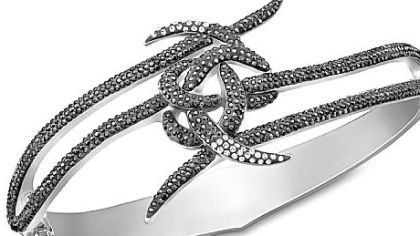 The Bond love knot bangle, featured in the new movie "Skyfall," is $270 at www.swarovski.com and Swarovski locations.