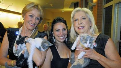 Cindy Russell with Marco, Betty Rich and Sarah McKean with Melissa.