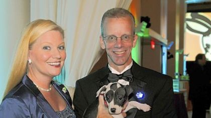 Patty and David Swisher, president and CEO of Animal Friends with Summer.