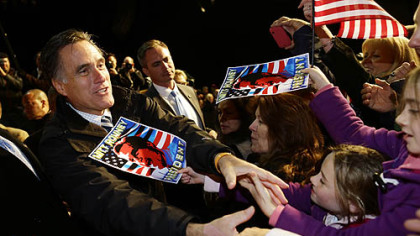 Republican presidential candidate Mitt Romney greets supporters Sunday at a Virginia campaign rally at Newport News International Airport, in Newport News, Va.