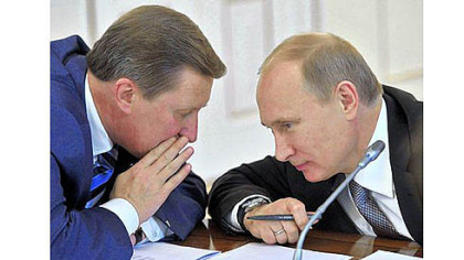 Russian President Vladimir Putin, right, listens to Sergei Ivanov, the Kremlin's chief of staff, during a meeting at the Novo-Ogaryovo residence outside Moscow on Tuesday.