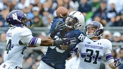 Brandon Moseby-Felder, middle, attempts to zero in on a pass against Northwestern earlier this season. Moseby-Felder is third among Penn State receivers with 25 catches this season.