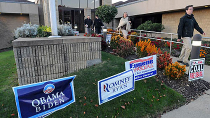 Voters stream out of the Green Tree Municipal Building after casting their ballots early Tuesday.