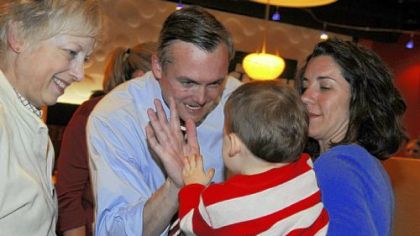 Democrat Matt Smith celebrates Tuesday night with son Jameson, 1, as his wife Eileen, right, and his mother, Janise Smith, look on at the Walnut Grille in Mt. Lebanon. Mr. Smith defeated Republican D. Raja for state Senate.