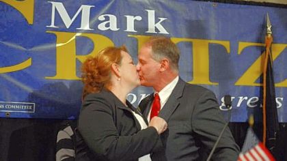 Rep. Mark Critz kisses his wife, Nancy, Tuesday after conceding his re-election bid to challenger Keith Rothfus at the Holiday Inn in Johnstown.