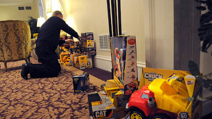More trucks are added to the collection at  Slater Funeral Home in Green Tree, where people donated the toys in memory of two-year-old Maddox Derkosh.