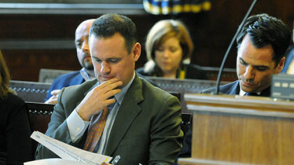 Mayor Luke Ravenstahl prepares before making remarks at a hearing in city council chambers.