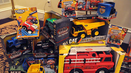 An arrangement of trucks at  Slater Funeral Homes in Green Tree left in memory of Maddox Derkosh, 2.