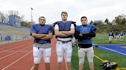 Mt. Lebanon football players Ian Averberg-Johnson (6 feet, 290 pounds), Alex Bookser (6-6, 290) and Matt Hoffman (6-2, 230) represent the typical size of today's high school linemen at the Class AAAA level.