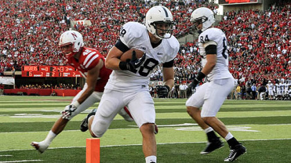 Penn State's Jesse James scores a touchdown in the first half.