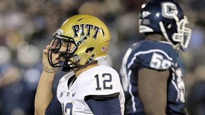 Quarterback Tino Sunseri walks off the field after failing to get a first down in the first half Friday in East Hartford, Conn.