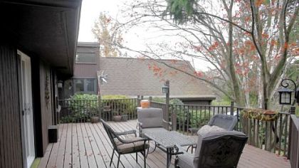 Outside, Mr. Wizig replaced a cracked concrete patio and crumbling built-in planters with a new, larger pressure-treated wood deck that is shaded by a large Japanese maple and other mature trees.
