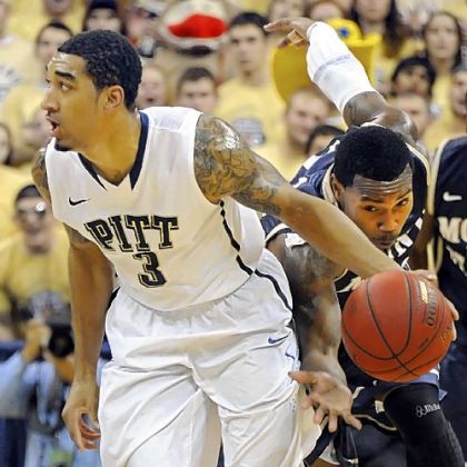 Pitt sophomore Cameron Wright steals the ball from Mount St. Mary's Rashad Whack in the first half Friday at the Petersen Events Center.