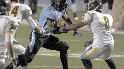 Washington's Shai McKenzie runs the ball against Seton-LaSalle Friday in Canonsburg, Pa.