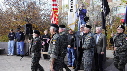 The Vietnam Veterans Inc. Honor Guard takes part in a ceremony honoring Vietnam veterans and the 25th anniversary of the Vietnam Veterans Monument on the North Shore.