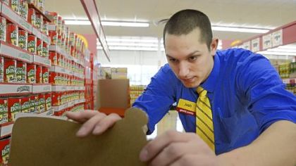 This is someone stocking shelves.