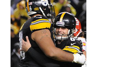 Steelers kicker Shaun Suisham celebrates with tackle Mike Adams after kicking the game-winning field goal against the Chiefs in overtime.