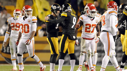Steelers kicker Shaun Suisham is congratulated by Drew Butler after kicking a field goal to win the game against the Chiefs in overtime Monday night at Heinz Field.