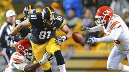 Steelers tight end David Paulson looses control of the football against the Chiefs.