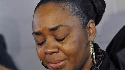 Latonya Green, mother of Leon Ford, who was shot by Pittsburgh Police during a traffic stop November 12, 2012, cries during a press conference at which the family called upon the city and the police to allow them to see him in the hospital.