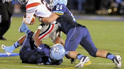 Chayse Dillon, being tackled by Central Valley's Ricky Zuk (No. 24) and Ryan Roberson, is one of four effective running backs for West Allegheny.