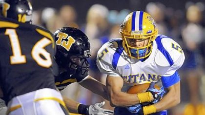 West Mifflin running back Jimmy Wheeler carries the ball against Thomas Jefferson earlier this season.