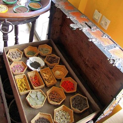 A shop in Marrakesh displays saffron, turmeric, harissa, and cinnamon, the signature spices of North African cuisine.