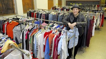 Brandon Grbach stands in the clothing room in the former Hartman school, 1200 Wolfe Ave., North Braddock.