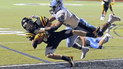 North Allegheny's Gregg Garrity scores a touchdown against Seneca Valley earlier this season. Garrity has caught 41 passes for 864 yards with 12 touchdowns this year.