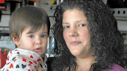 Jennifer Beiswenger holds her daughter, Bella. Ms. Beiswenger was diagnosed with cervical cancer in 2011 after Bella's birth.