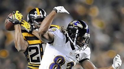 Steelers cornerback Ike Taylor breaks up a pass intended for Ravens receiver Torrey Smith in the first quarter Sunday at Heinz Field.