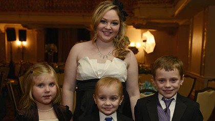 From left, Hannah Kalp, 6; Kelly DeDomenic, 20; Jaden Duttine, 5, with his brother Joey, 7.