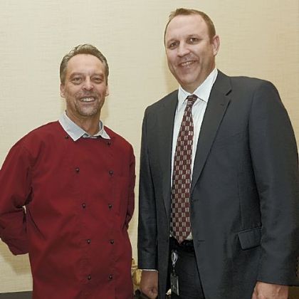Signature Chef Culinary Award winner Christian Mayrhofer and event chair Brian Boeglin.
