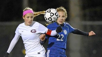 Greensburg Central Catholic's Malea Fabean, left, jostles with Shady Side's Tori Winter during PIAA semifinal match.