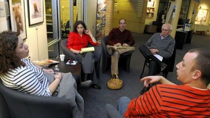 Randi Rumbaugh, left, and her husband, Nick, 33, right, at an interfaith couples workshop with Rabbis Amy and Alex Greenbaum and Marvin Lalli of Squirrel Hill. The workshop was held at the Jewish Community Center of Greater Pittsburgh-South Hills.