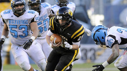 North Allegheny quarterback Mack Leftwich carries against Woodland Hills Friday in the WPIAL class AAAA championships at Heinz Field.
