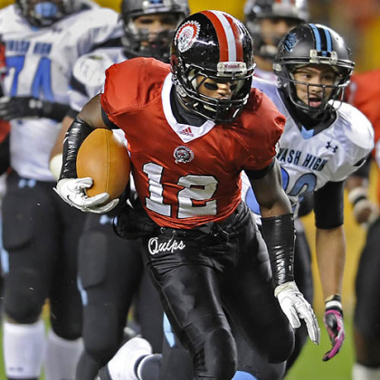 Aliquippa's Terry Swanson runs for a touchdown against Washington Friday in the WPIAL class AA championships at Heinz Field.