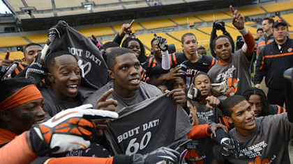 The Bears celebrate their record-breaking win with "Bout Dat" t-shirts  Friday at Heinz Field.