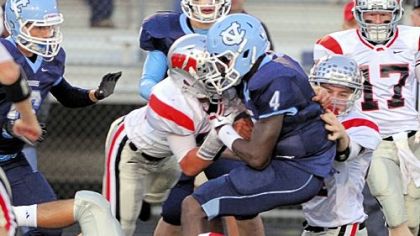 West Allegheny's swarming defenders made things tough for opponents all season, including Central Valley star Robert Foster shown here being tackled in a September game. The Indians have allowed only 26 points in their past seven games.