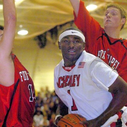 Schenley's Greg Blair grabs a rebound against Fox Chapel in a 2007 game. Blair, the younger brother of NBA player DeJuan Blair is finishing his senior season as a football player at the University of Cincinnati.