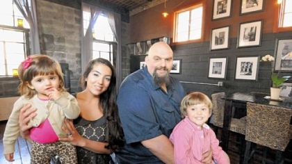 Braddock Mayor John Fetterman at home with his wife, Gisele; son, Karl; and daughter, Grace.