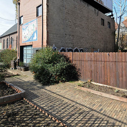Exterior of Braddock Mayor John Fetterman's home, where two shipping containers make up the third floor.