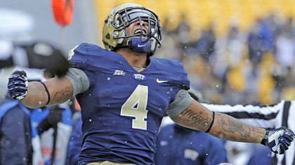 Pitt's Rushel Shell celebrates after a carry against Rutgers in the second quarter this afternoon at Heinz Field.