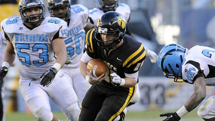 North Allegheny quarterback Mack Leftwich carries against Woodland Hills Friday in the WPIAL Class AAAA championship at Heinz Field.