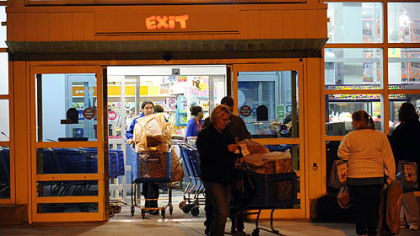 Shoppers outside Toys R Us in Robinson before the 8 p.m. opening of the store.