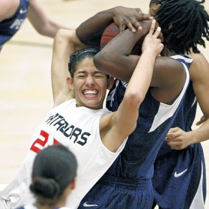 Cal State Northridge's Violet Alama, left, and Penn State''s Nikki Greene fight for a loose ball in the second half of a women's game in the Radisson Hotel Chatsworth Thanksgiving tournament, in Northridge, Calif.  Penn State won 85-73.
