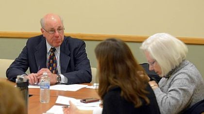Squirrel Hill Urban Coalition president Ray Baum, left, with board member Ceci Sommers, right, and Squirrel Hill Magazine editor Adrienne Block. Community advocacy by the coalition helped to keep blight from taking hold in the neighborhood.