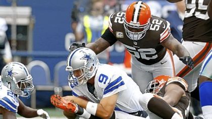 Craig Robertson, top, and D'Qwell Jackson register one of Cleveland's seven sacks against Dallas quarterback Tony Romo last week in the Browns' 23-20 overtime loss to the Cowboys.