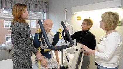 Sandra Truschel, center, an ergonomics coordinator with Excela Health Westmoreland, teaches Elizabeth Maschak, left, a registered medical assistant, and Debra Widziszewski, an MRI technologist, how to lift a patient during a lift training class at the Greensburg hospital.