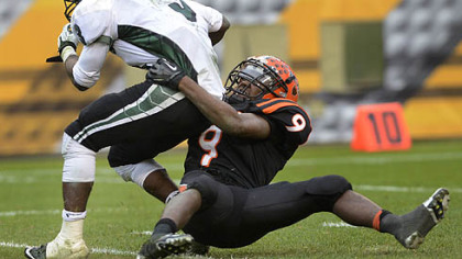Clairton Bear Robert Boatright takes down Sto-Rox quarterback Lenny Williams Friday at Heinz Field.